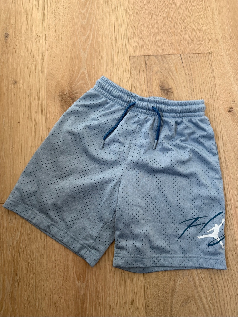 Boy’s Jordan Light Blue Mesh Athletic Shorts with Drawstring